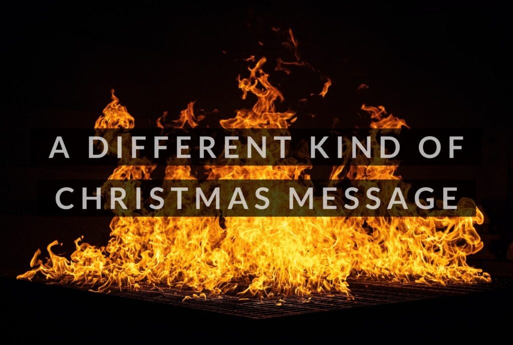 a poster saying A DIFFERENT KIND OF CHRISTMAS MESSAGE