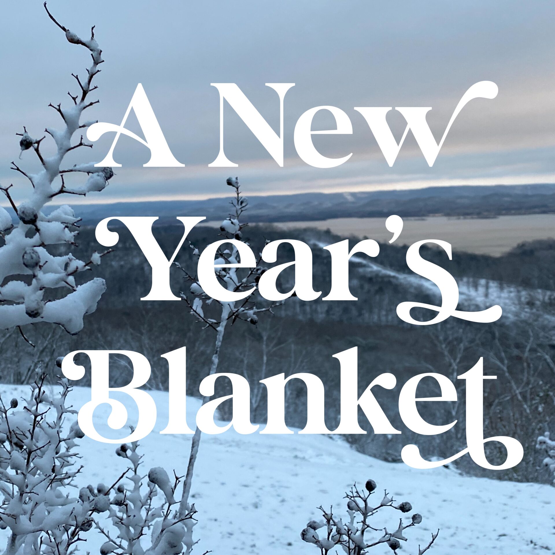 a snowy mountain with text saying New Years Blanket